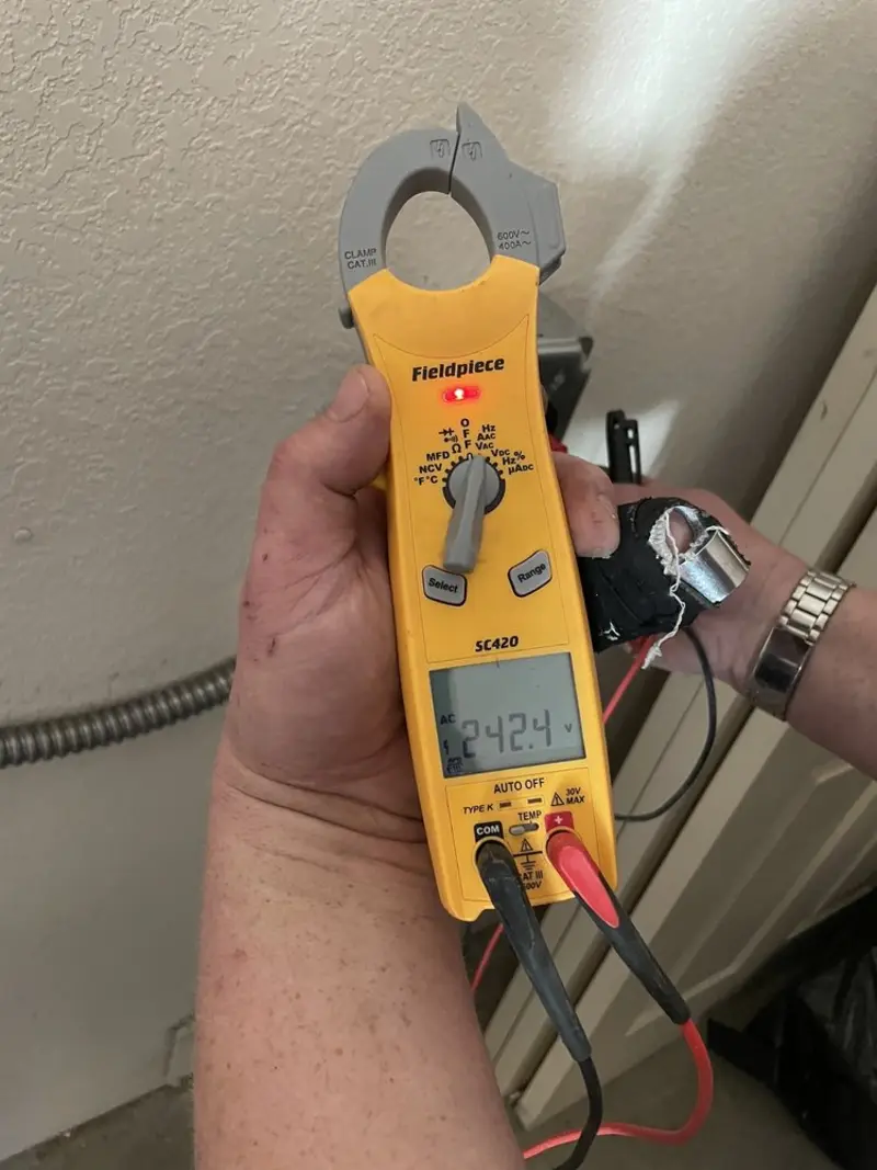 Voltage testing with clamp meter during Hot Tub / Pool Electrical Wiring in Bethalto